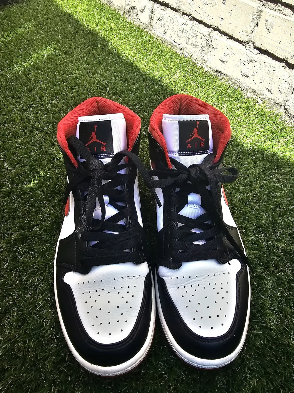 Jordan Mid-Top Sneakers in Black, White & Red
